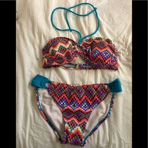 Two piece bathing suit. Top size M. Bottom size L
